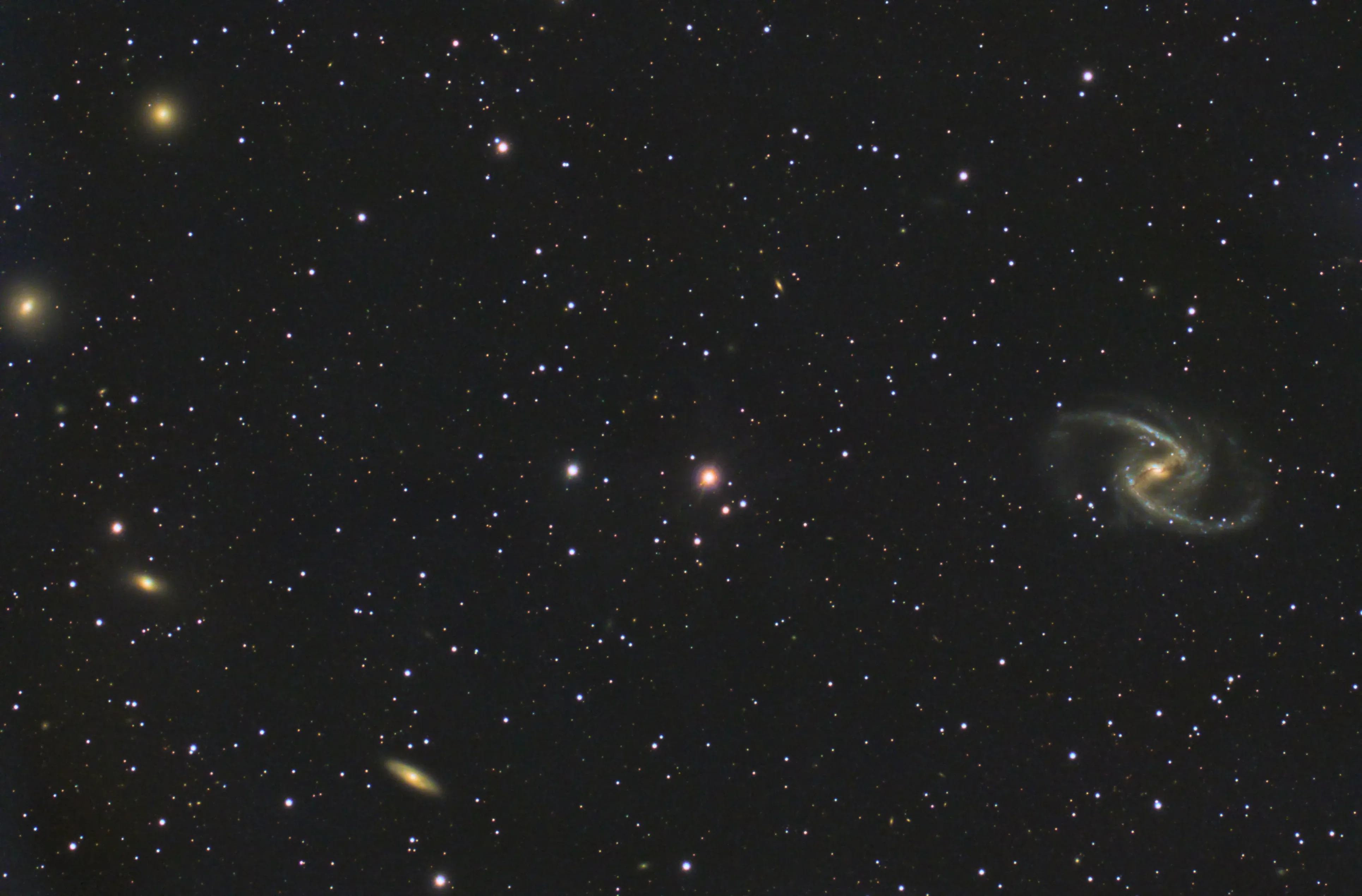 An astrophotographer working beneath the Milky Way